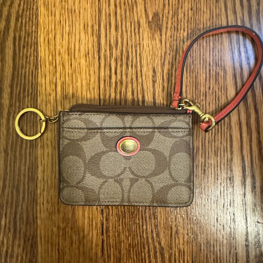 Coach Brown Monogram Wristlet with Coral Trim